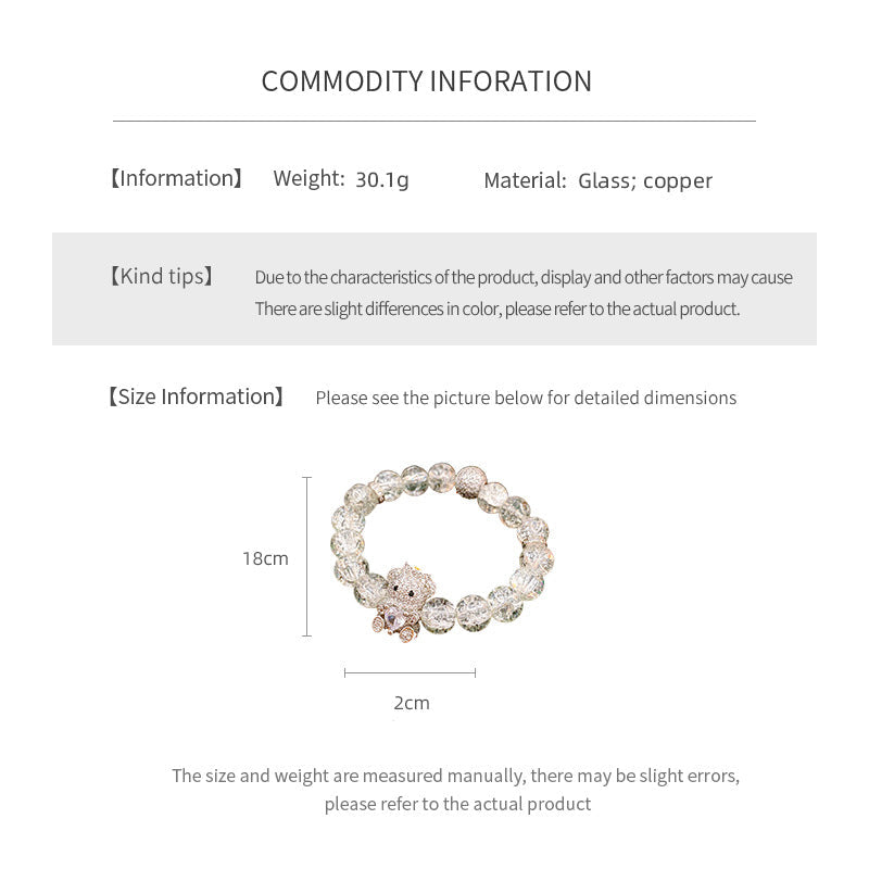 Clear crackle-glass beaded bracelet with pavé bear charm holding a heart — Glacial Heart Bear Bracelet.
