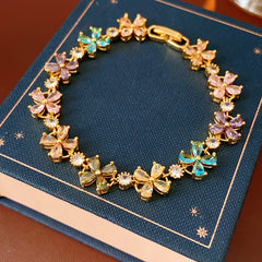 Celestial Clover Bracelet with multicolor zircon four-leaf clovers in golden settings – Glazenya jewelry
