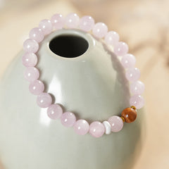 Natural purple lithium bead bracelet with central copper bead accent — Blush Tranquility Bracelet by Glazenya.