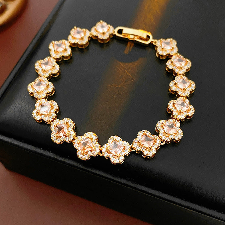 Eternal Flora Bracelet with gold-plated floral zircon motifs on black background – Glazenya jewelry