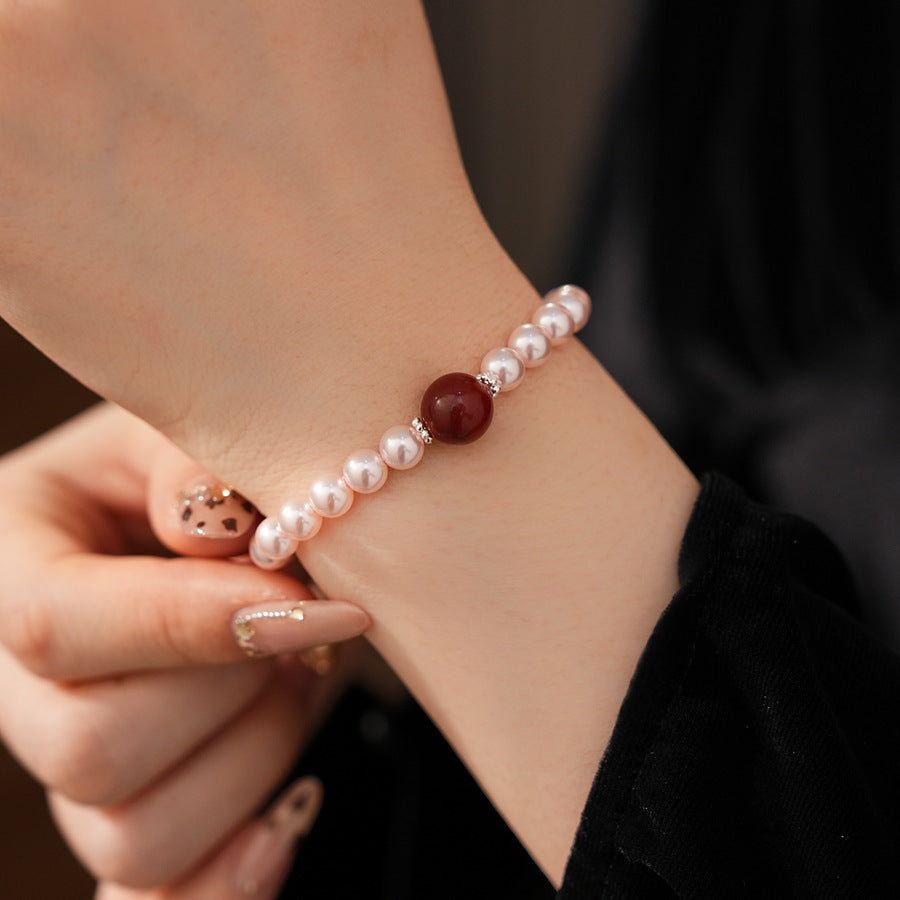 Blush Shijia pearl bracelet with a crimson agate centerpiece and pavé spacers — Crimson Kiss Pearl Bracelet by Glazenya.