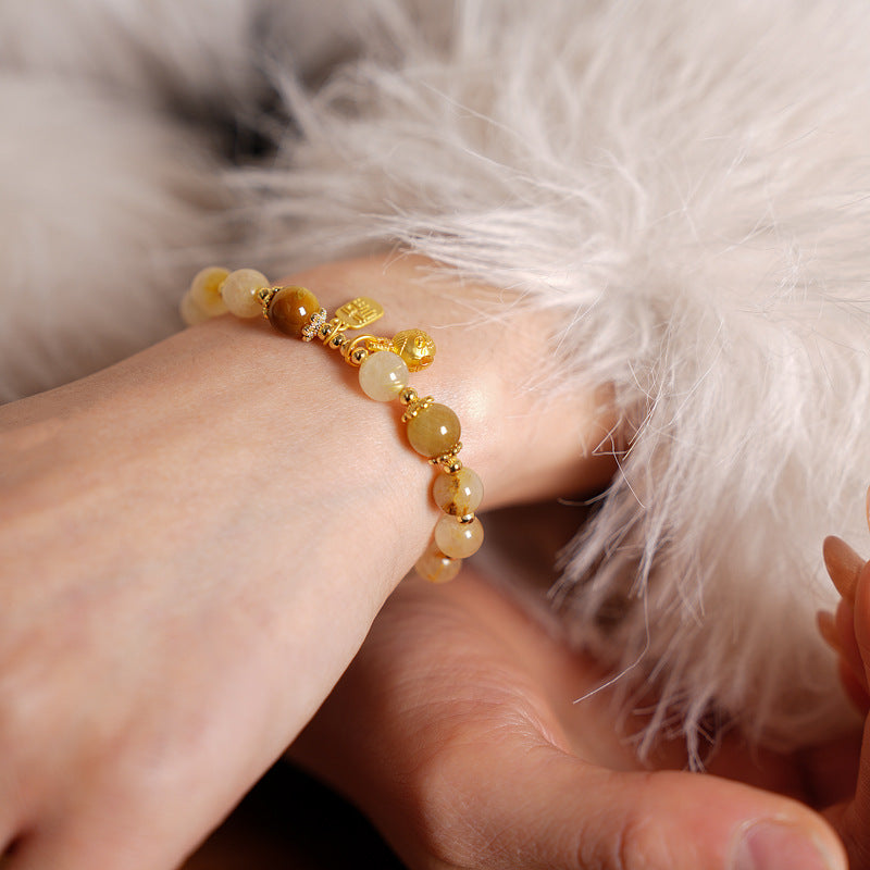 Crystal beaded bracelet with gold-tone accents and fortune & ingot charms, light-luxury style