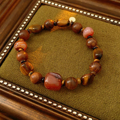 Zen Harmony Beaded Bracelet with agarwood, agate, and tiger eye stones in natural earthy tones