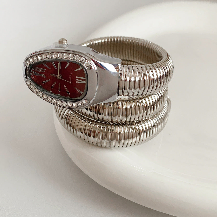 Silver tubular coil wrap cuff bracelet with pavé teardrop end cap — Serpentine Coil Wrap Cuff by Glazenya.