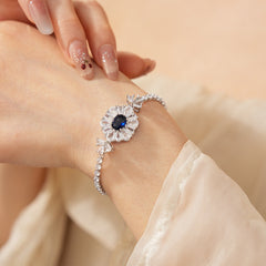 Starlit Dahlia Bracelet with blue oval gemstone and zircon floral halo – Glazenya jewelry