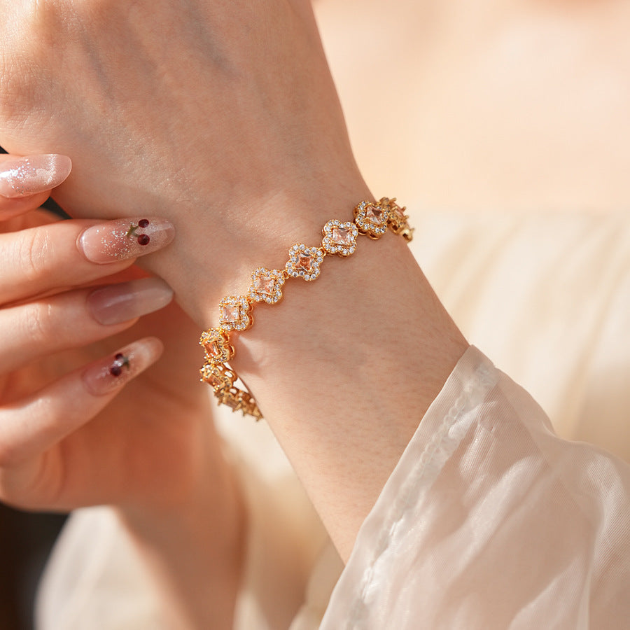 Eternal Flora Bracelet with gold-plated floral zircon motifs on black background – Glazenya jewelry