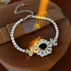 Starlit Dahlia Bracelet with blue oval gemstone and zircon floral halo – Glazenya jewelry