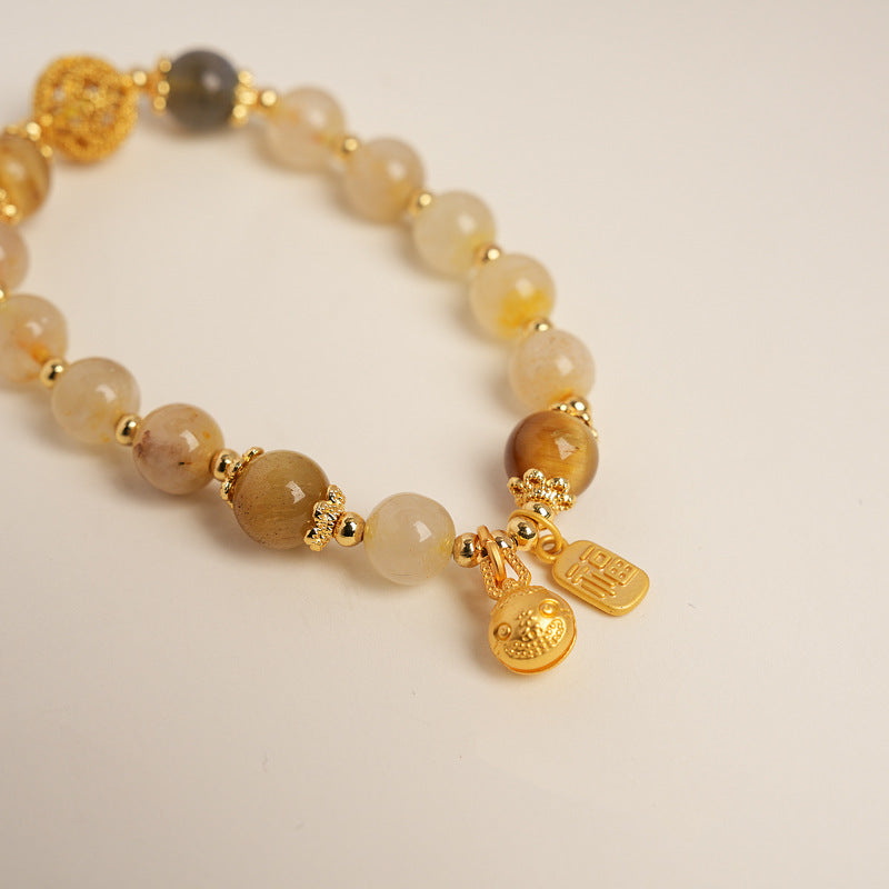 Crystal beaded bracelet with gold-tone accents and fortune & ingot charms, light-luxury style