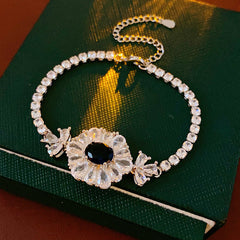 Starlit Dahlia Bracelet with blue oval gemstone and zircon floral halo – Glazenya jewelry