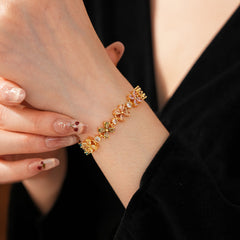 Celestial Clover Bracelet with multicolor zircon four-leaf clovers in golden settings – Glazenya jewelry