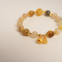 Crystal beaded bracelet with gold-tone accents and fortune & ingot charms, light-luxury style
