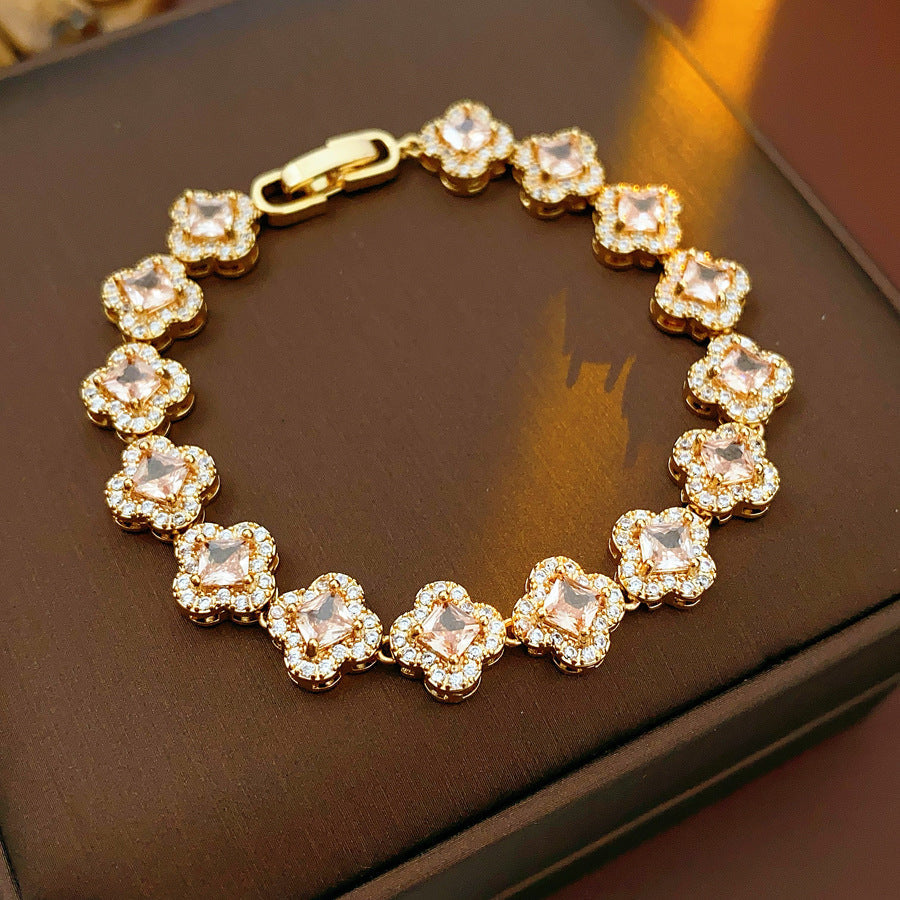 Eternal Flora Bracelet with gold-plated floral zircon motifs on black background – Glazenya jewelry