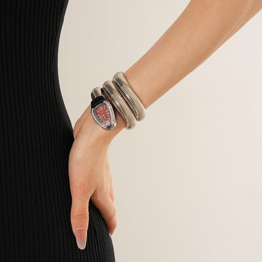 Silver tubular coil wrap cuff bracelet with pavé teardrop end cap — Serpentine Coil Wrap Cuff by Glazenya.