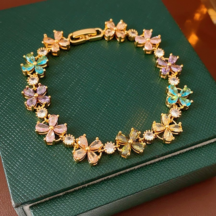 Celestial Clover Bracelet with multicolor zircon four-leaf clovers in golden settings – Glazenya jewelry
