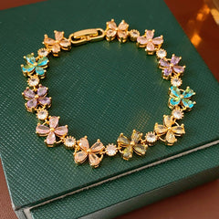Celestial Clover Bracelet with multicolor zircon four-leaf clovers in golden settings – Glazenya jewelry