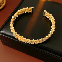Gold and silver textured open cuff bangles with a lace-like granulated surface — Starlit Lace Cuff Bracelet.