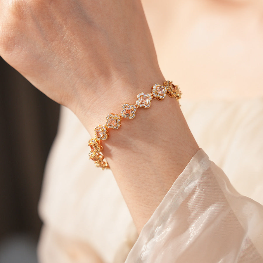 Eternal Flora Bracelet with gold-plated floral zircon motifs on black background – Glazenya jewelry