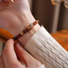 Orange garnet bracelet with zircon heart accent — Ember Heart Garnet Bracelet by Glazenya.
