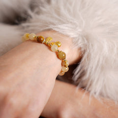 Crystal beaded bracelet with gold-tone accents and fortune & ingot charms, light-luxury style