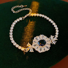 Starlit Dahlia Bracelet with blue oval gemstone and zircon floral halo – Glazenya jewelry