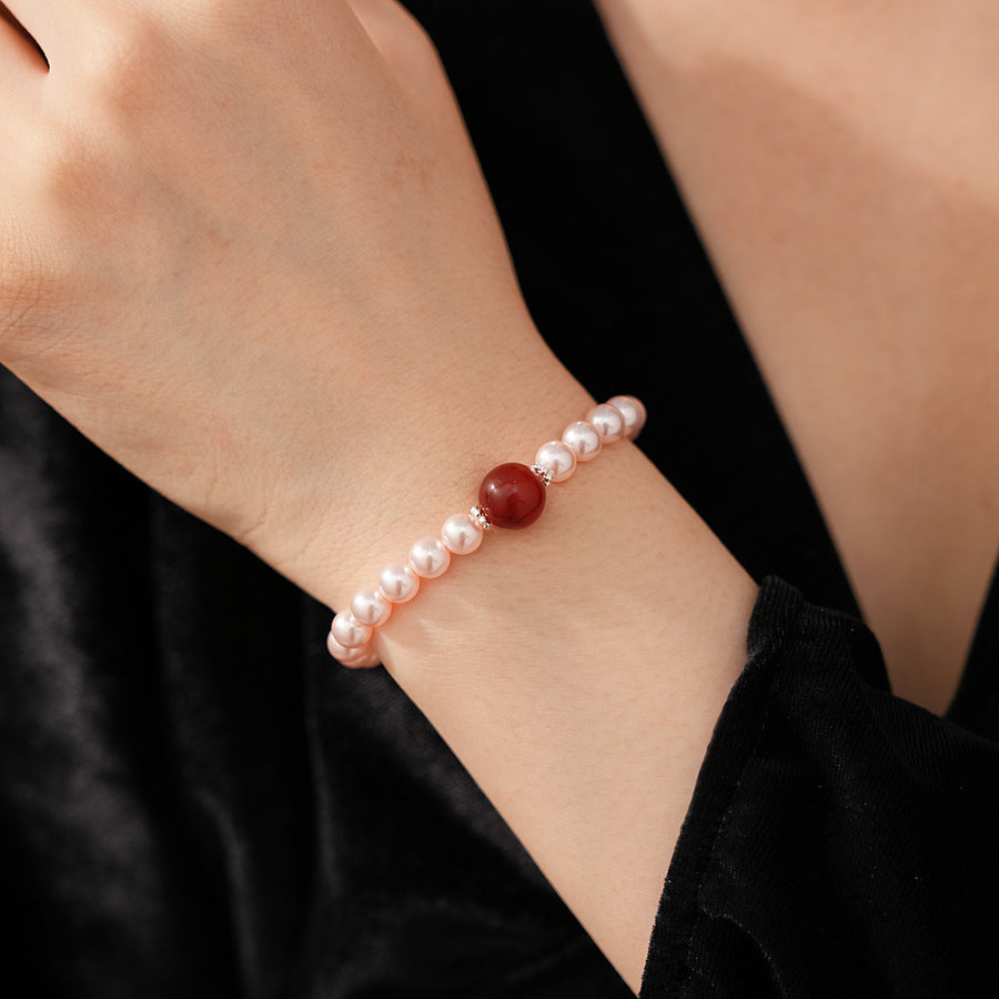 Blush Shijia pearl bracelet with a crimson agate centerpiece and pavé spacers — Crimson Kiss Pearl Bracelet by Glazenya.
