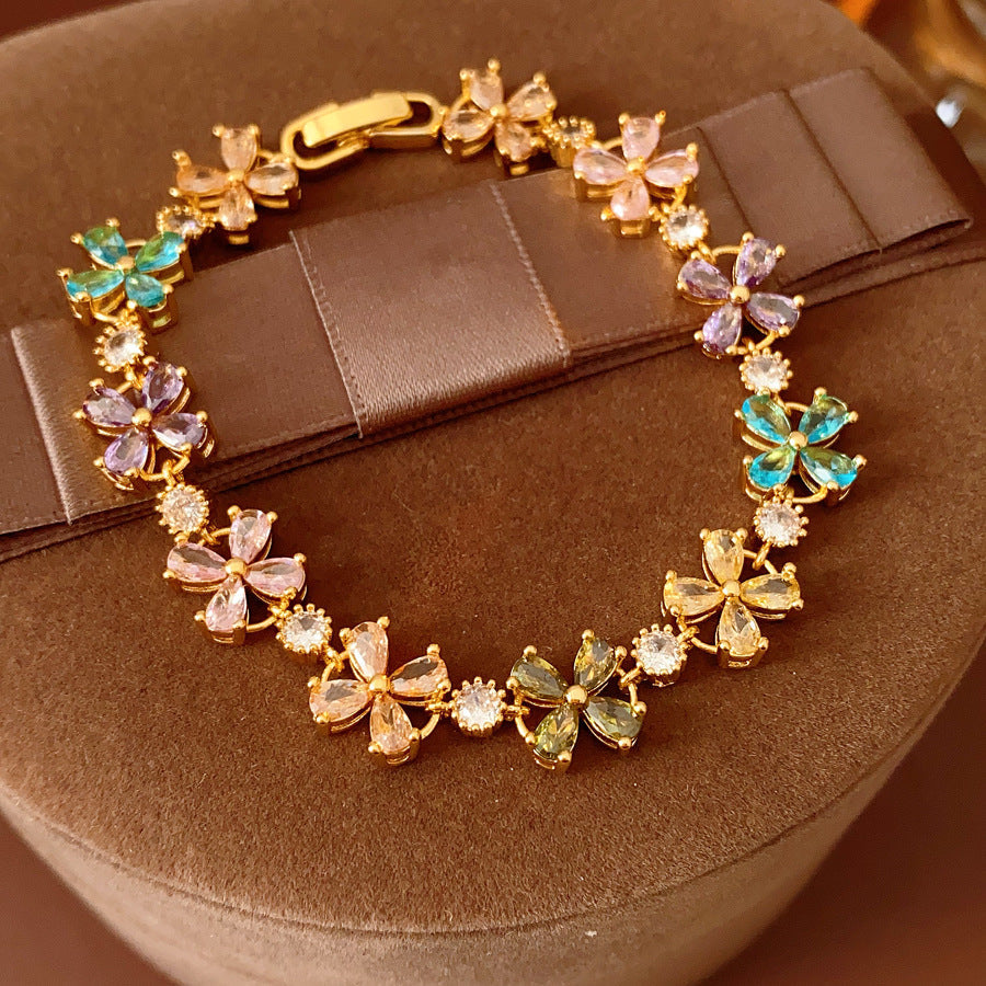 Celestial Clover Bracelet with multicolor zircon four-leaf clovers in golden settings – Glazenya jewelry
