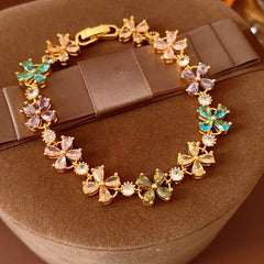 Celestial Clover Bracelet with multicolor zircon four-leaf clovers in golden settings – Glazenya jewelry