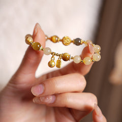 Crystal beaded bracelet with gold-tone accents and fortune & ingot charms, light-luxury style