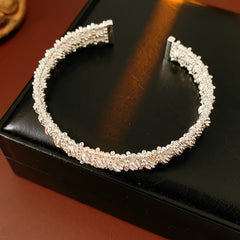 Gold and silver textured open cuff bangles with a lace-like granulated surface — Starlit Lace Cuff Bracelet.