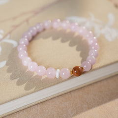 Natural purple lithium bead bracelet with central copper bead accent — Blush Tranquility Bracelet by Glazenya.