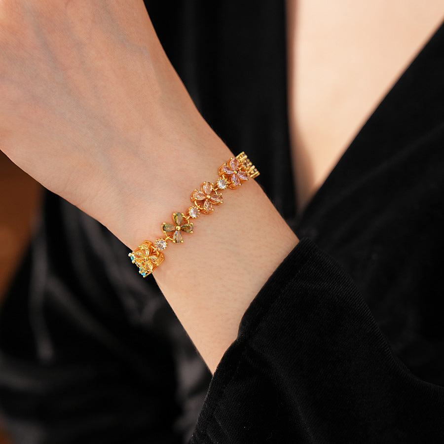 Celestial Clover Bracelet with multicolor zircon four-leaf clovers in golden settings – Glazenya jewelry