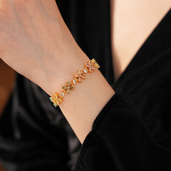 Celestial Clover Bracelet with multicolor zircon four-leaf clovers in golden settings – Glazenya jewelry