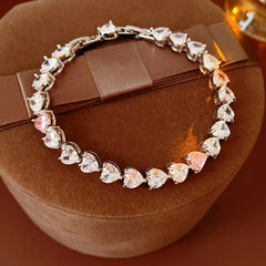 Pure Amour Bracelet with heart-cut white and pink zircon stones on gold clasp – Glazenya jewelry