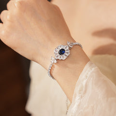 Starlit Dahlia Bracelet with blue oval gemstone and zircon floral halo – Glazenya jewelry
