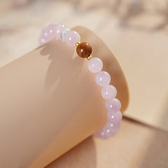 Natural purple lithium bead bracelet with central copper bead accent — Blush Tranquility Bracelet by Glazenya.