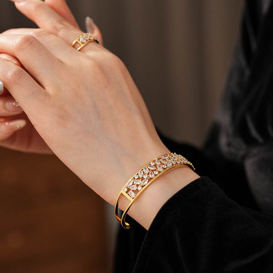 Gold and silver open cuff bracelet with matching pavé ring, set with sparkling zircons — Starlight Pavé Cuff Set by Glazenya.