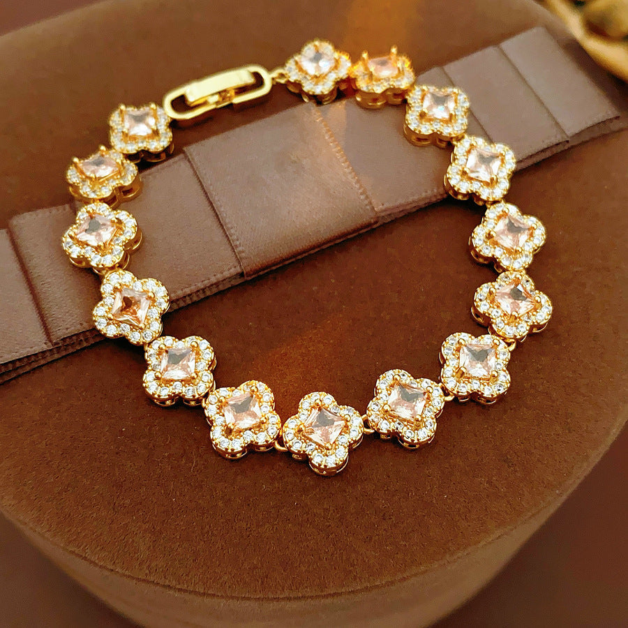 Eternal Flora Bracelet with gold-plated floral zircon motifs on black background – Glazenya jewelry