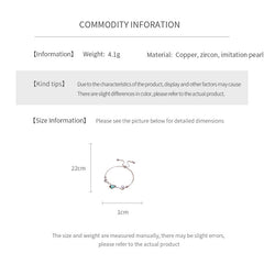 Aqua Moon Charm Bracelet with blue heart zircon, moon and star charms, and pearl detail – Glazenya jewelry