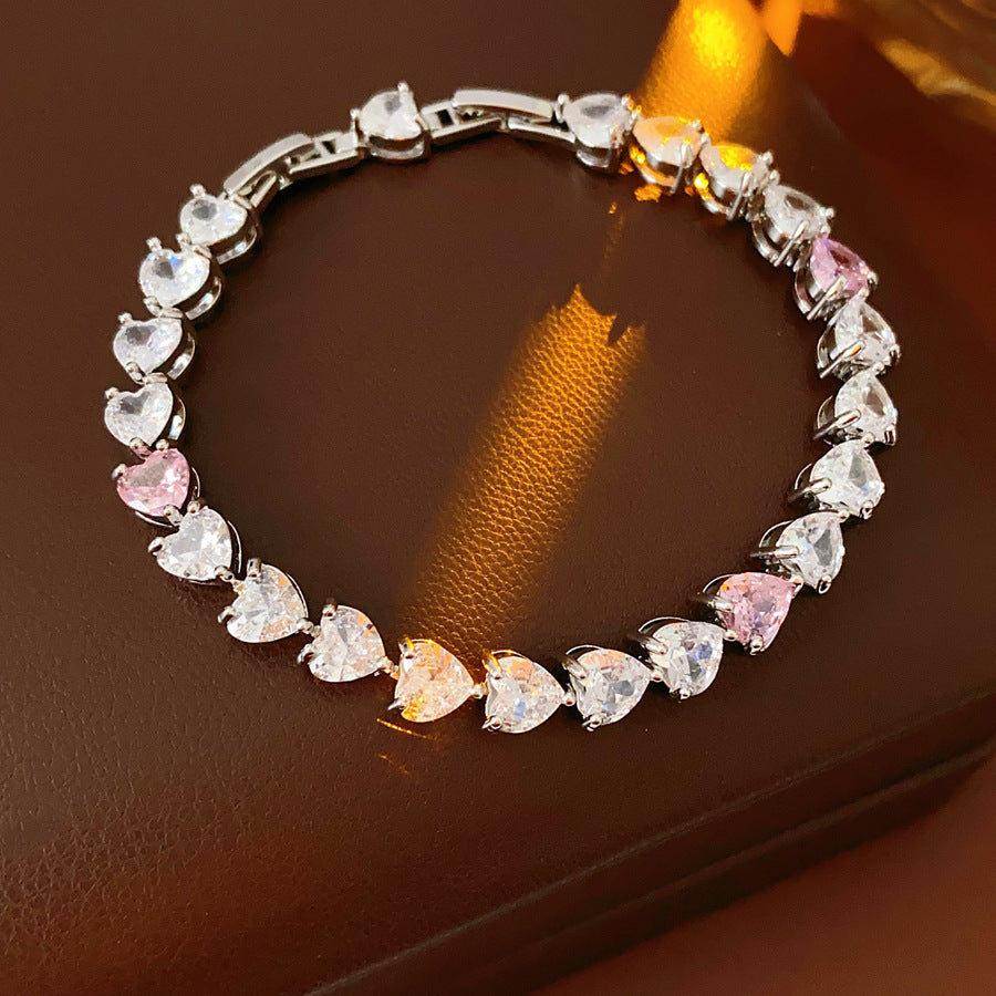Pure Amour Bracelet with heart-cut white and pink zircon stones on gold clasp – Glazenya jewelry