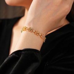 Celestial Clover Bracelet with multicolor zircon four-leaf clovers in golden settings – Glazenya jewelry