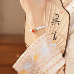 Trio Charm Pearl Bracelet