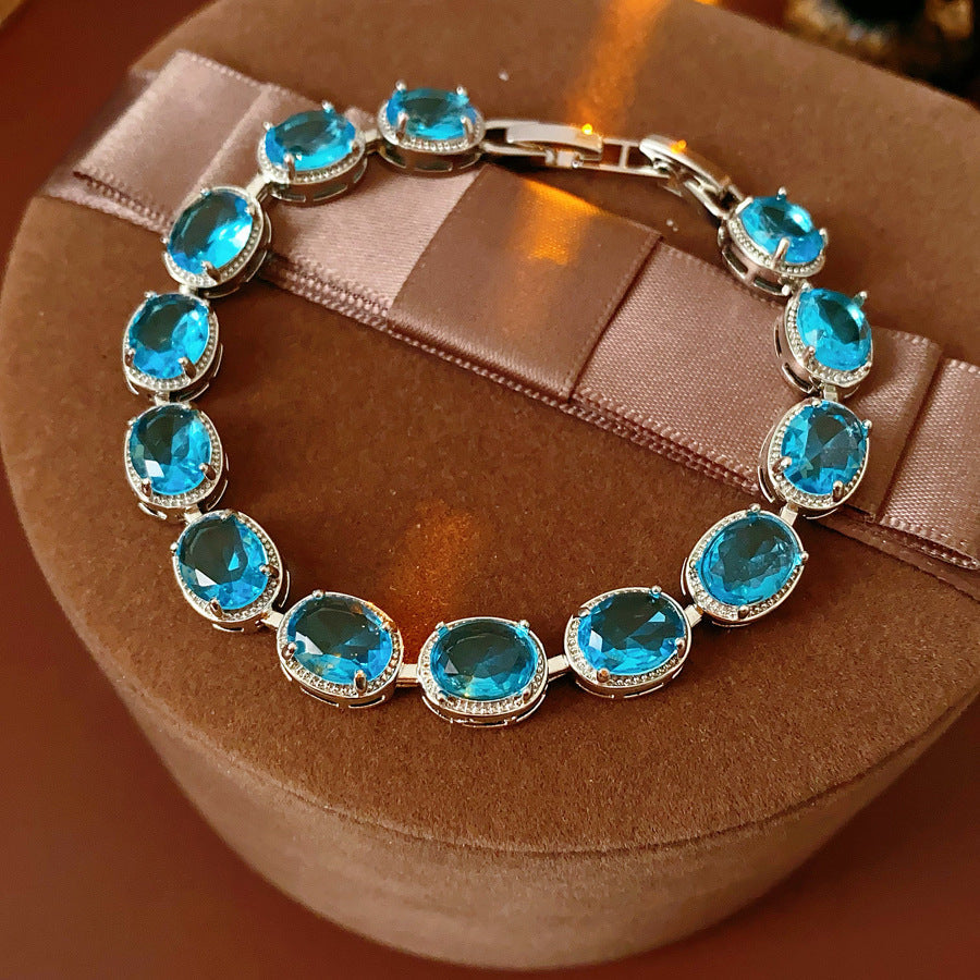 Silver-tone tennis bracelet with oval blue zircon stones — Azure Oval Zircon Tennis Bracelet.
