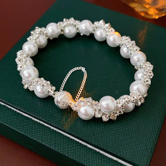 Elegant radiant crystal pearl wrap bracelet with imitation pearls and rhinestones, vintage luxury style
