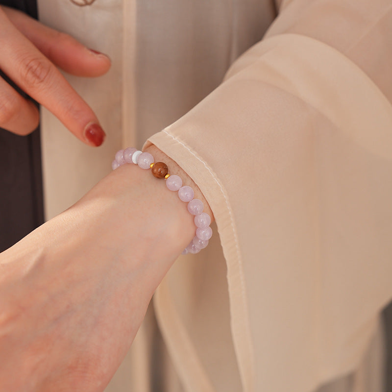 Natural purple lithium bead bracelet with central copper bead accent — Blush Tranquility Bracelet by Glazenya.