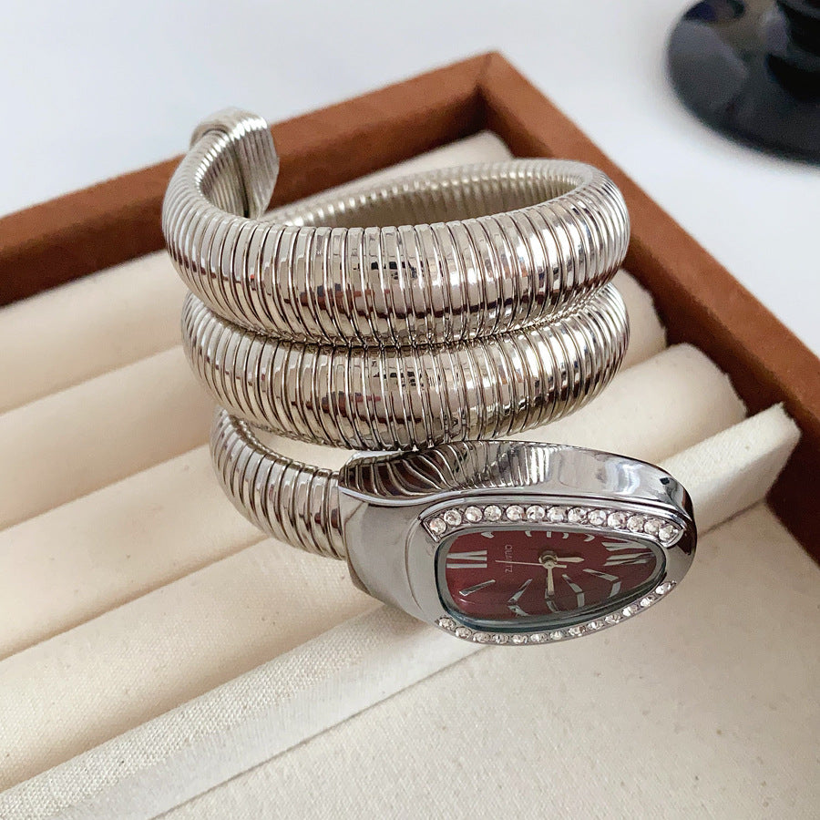 Silver tubular coil wrap cuff bracelet with pavé teardrop end cap — Serpentine Coil Wrap Cuff by Glazenya.